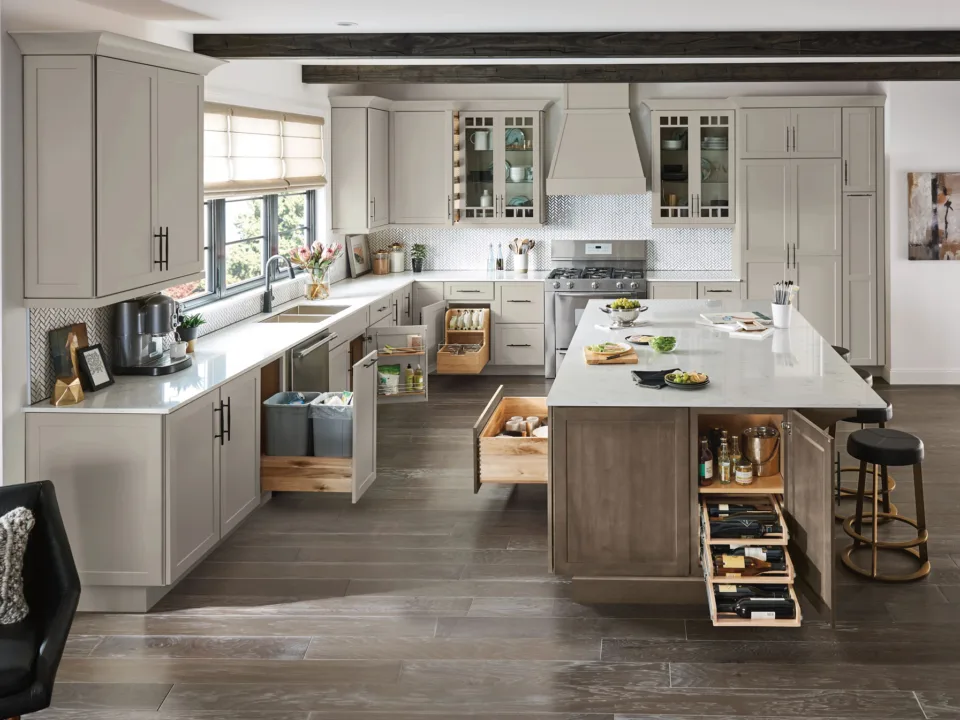 cool tone oak kitchen cabinetry with pull out cabinets